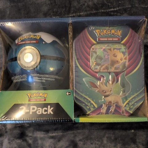 Evolution Celebration & Poké Ball Tin 2-Pack