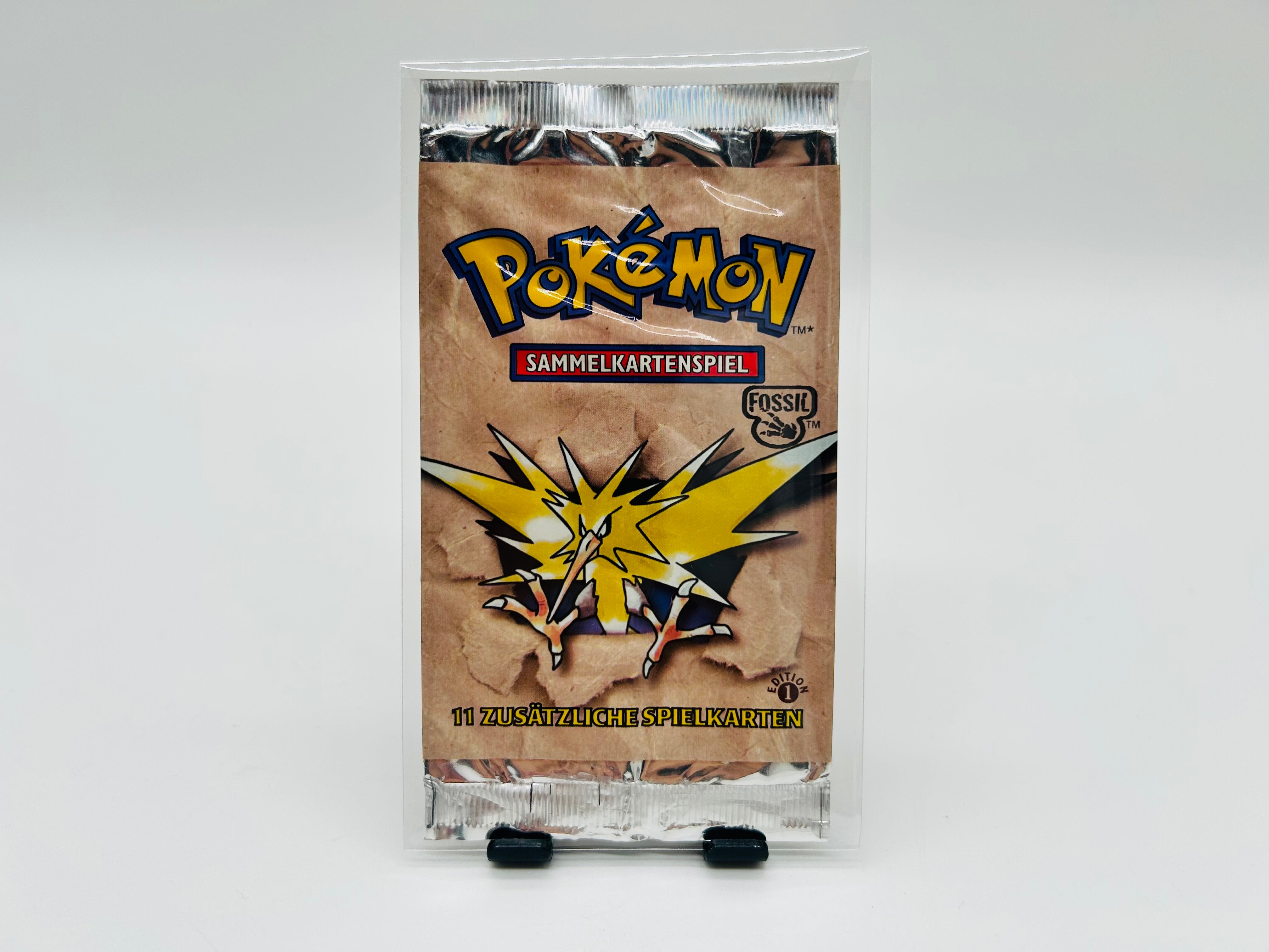 Fossil प्रथम संस्करण बूस्टर पैक — Zapdos
