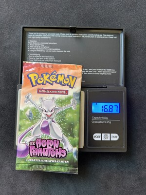 EX Holon Phantoms حزمة تعزيز · Mewtwo